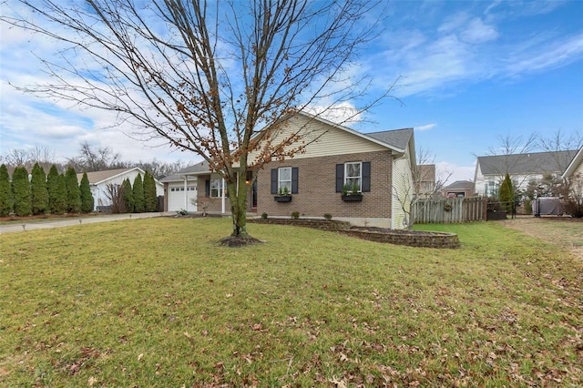 view of front of house with a garage and a front yard