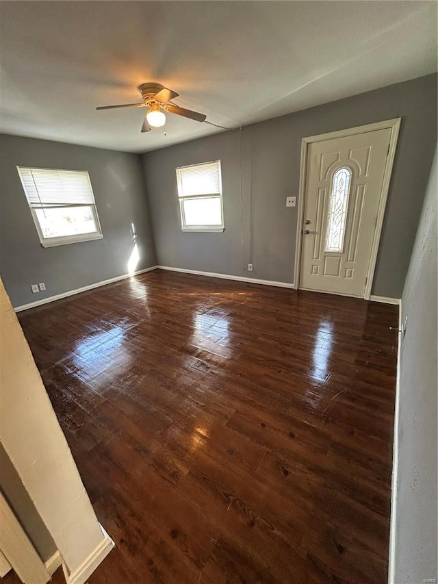 entrance foyer with dark hardwood / wood-style floors and ceiling fan