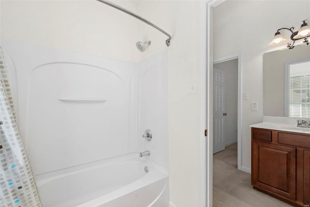 bathroom featuring baseboards, shower / tub combo with curtain, and vanity