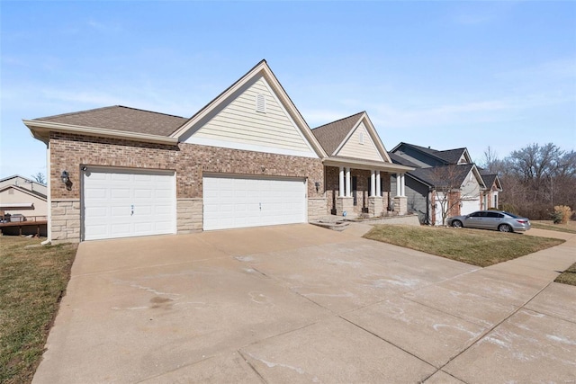 view of front of home with a garage, covered porch, brick siding, a shingled roof, and driveway