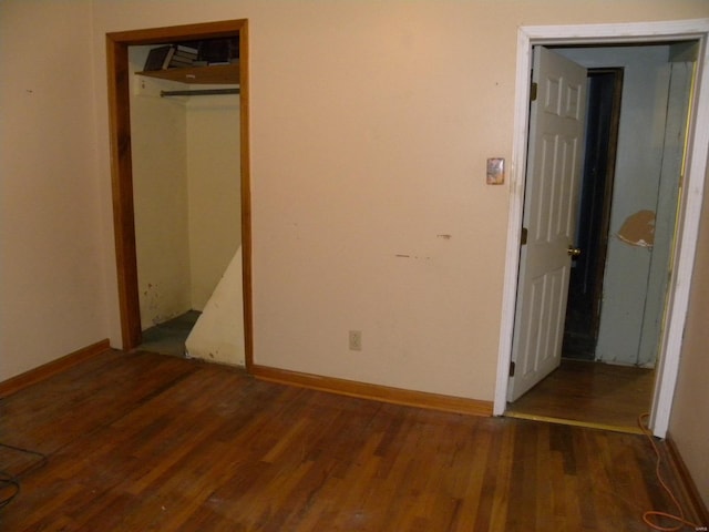 unfurnished bedroom with wood-type flooring