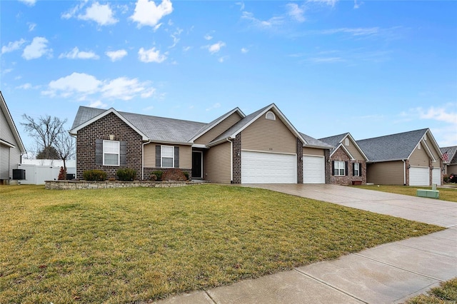 single story home with a garage and a front lawn