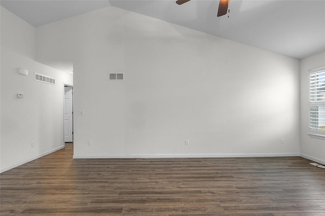 unfurnished room featuring ceiling fan, lofted ceiling, and dark hardwood / wood-style flooring