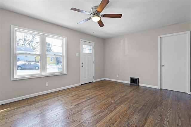 foyer entrance featuring ceiling fan and dark hardwood / wood-style floors