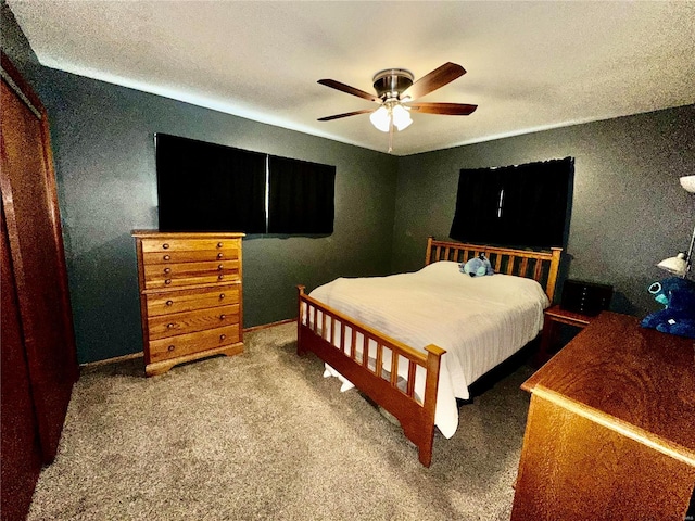 bedroom featuring carpet and ceiling fan