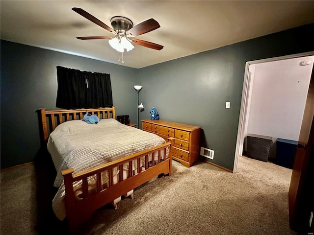 bedroom with light colored carpet and ceiling fan