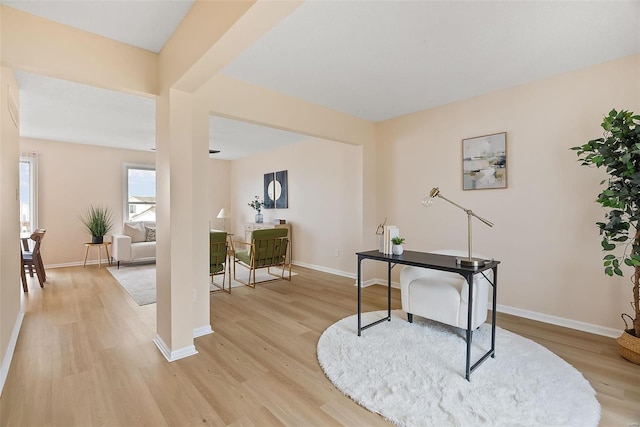 office space with light hardwood / wood-style flooring