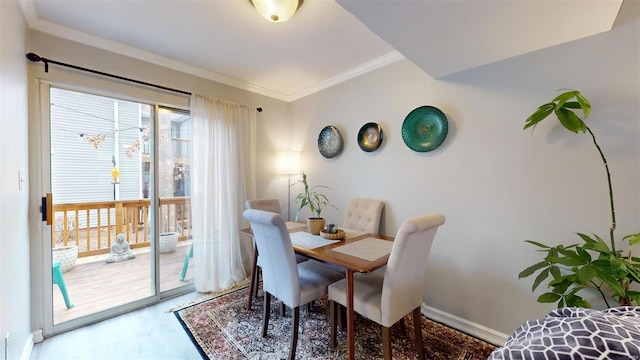 dining room with ornamental molding