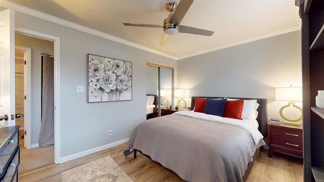 bedroom with ornamental molding, a closet, and light wood-type flooring