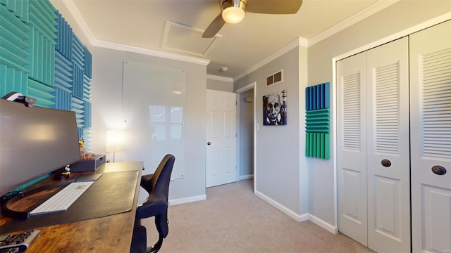 carpeted office space with ornamental molding and ceiling fan