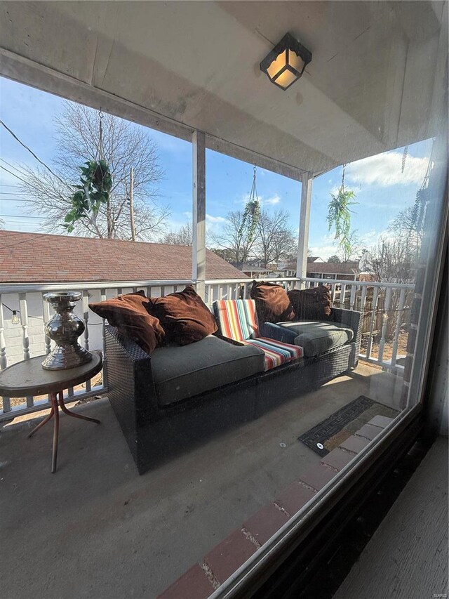 view of patio / terrace with a balcony