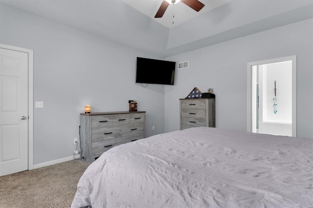 bedroom with ceiling fan and light carpet