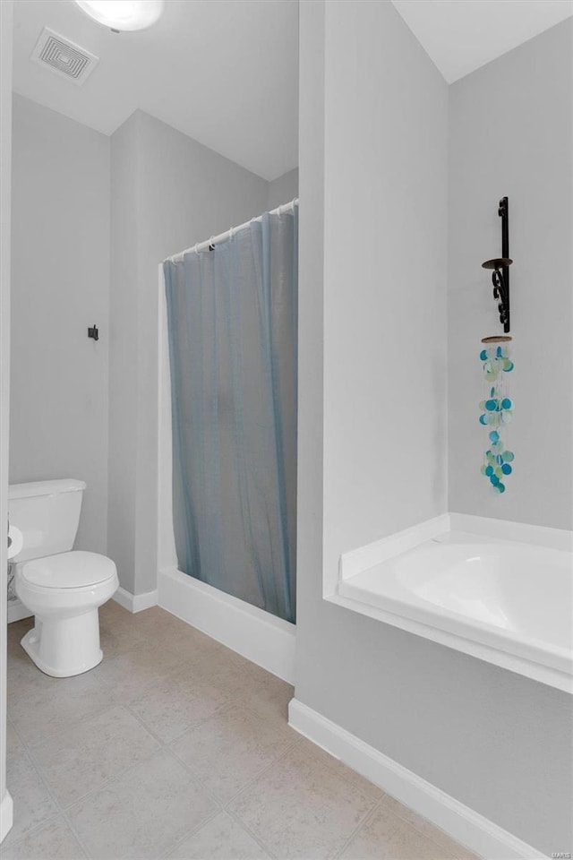 bathroom with toilet and curtained shower