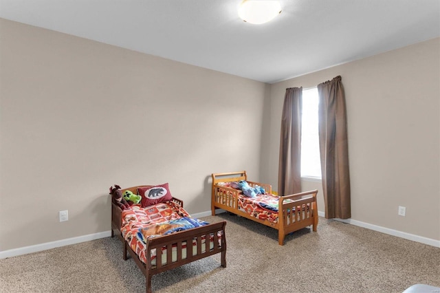 bedroom with light carpet