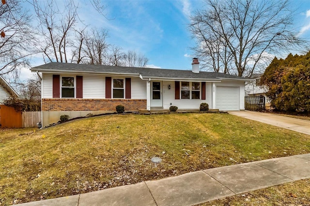 single story home featuring a garage and a front lawn