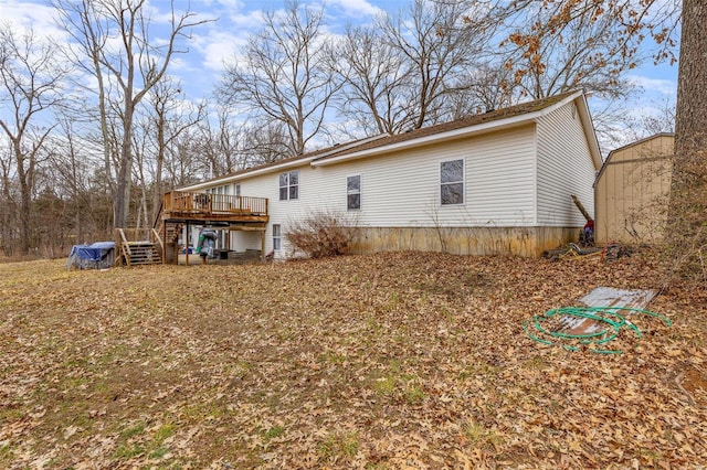 view of side of property with a deck