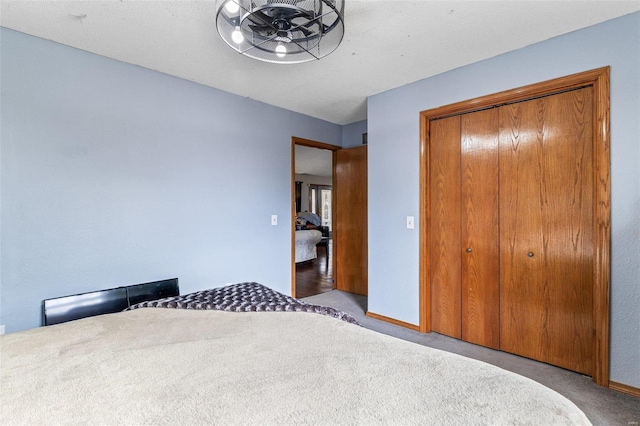 carpeted bedroom with a closet