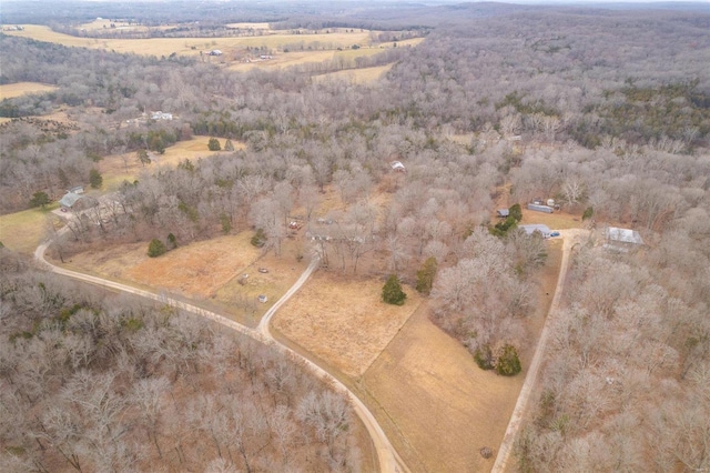 birds eye view of property with a rural view