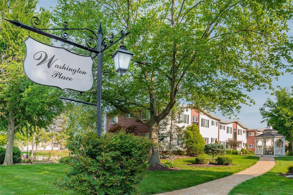 view of community featuring a yard and a gazebo