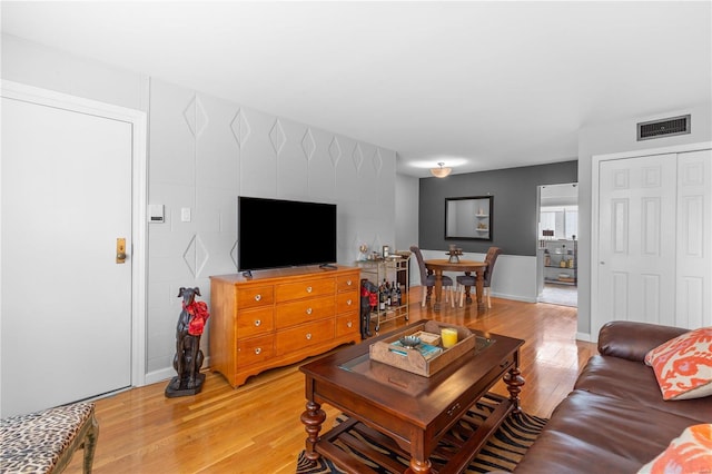 living room with light wood-type flooring