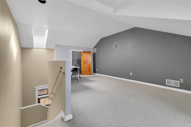 bonus room featuring carpet, visible vents, vaulted ceiling, and baseboards