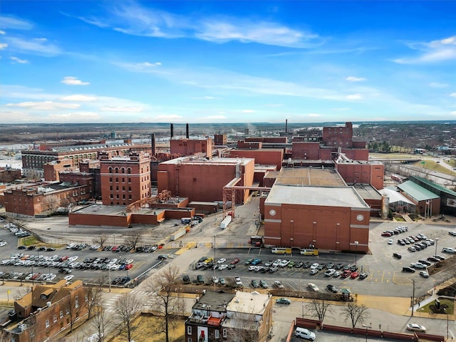 birds eye view of property with a view of city