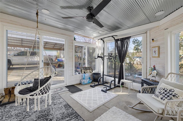 interior space featuring ceiling fan