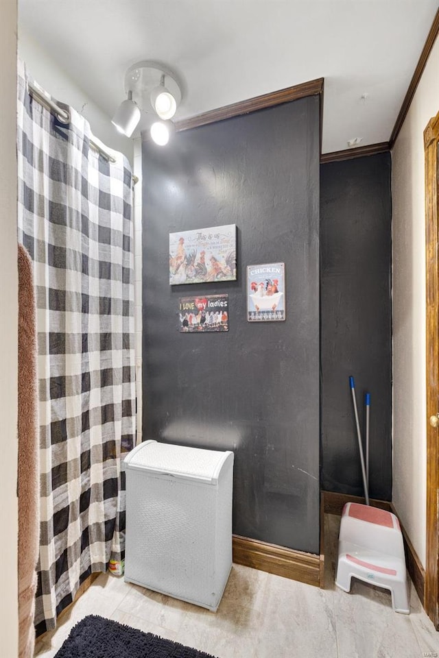 bathroom with crown molding