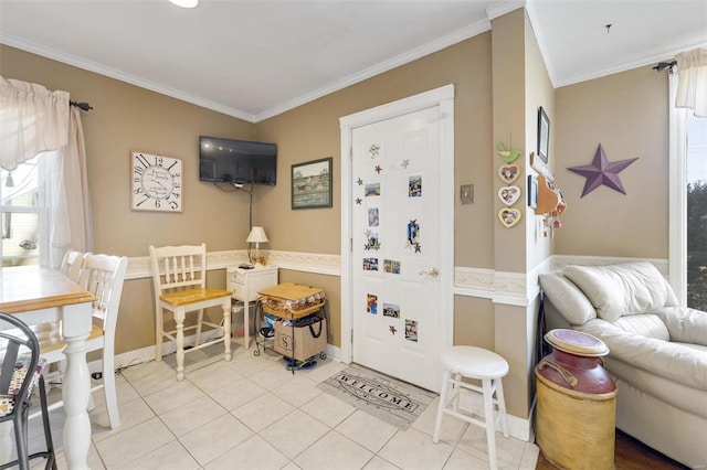 interior space featuring ornamental molding and light tile patterned floors