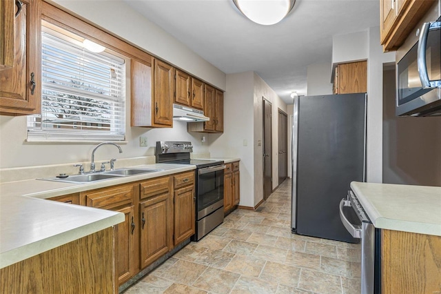 kitchen with sink and stainless steel appliances