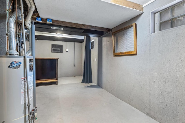 basement featuring gas water heater