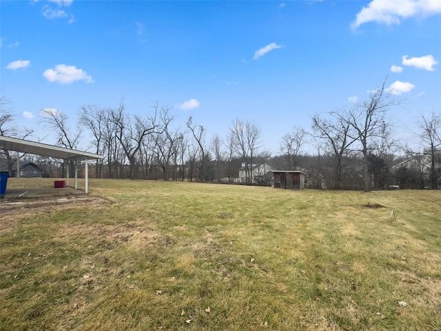 view of yard with a carport