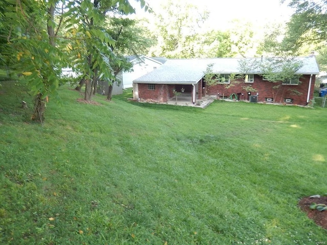 view of yard with a patio area