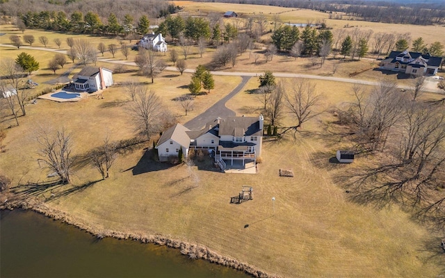 bird's eye view featuring a water view and a rural view