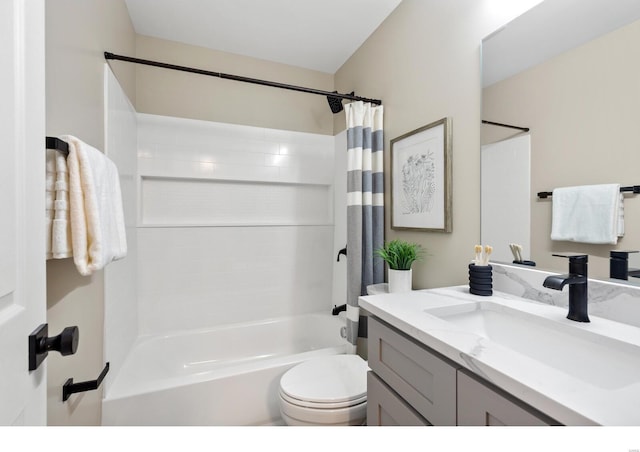 full bathroom featuring vanity, toilet, and shower / bath combo with shower curtain