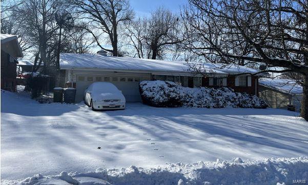 exterior space with a garage