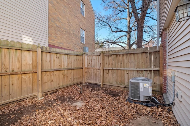 view of yard featuring central AC