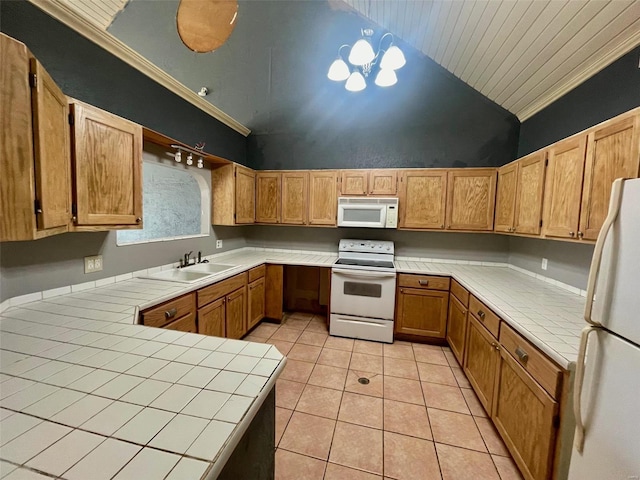 kitchen with lofted ceiling, sink, tile countertops, ornamental molding, and white appliances