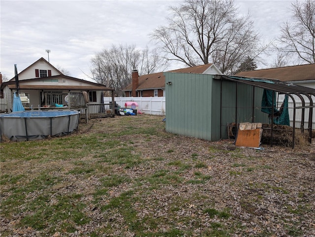 view of yard featuring a fenced in pool