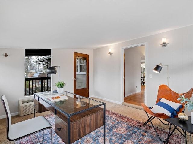 office area featuring carpet and a wall mounted AC