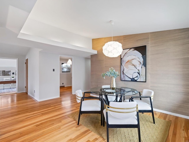 dining area with hardwood / wood-style flooring