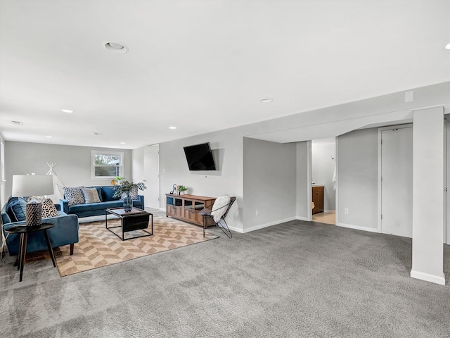 living room featuring light colored carpet