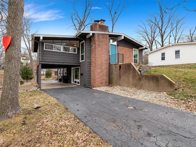 exterior space with a carport