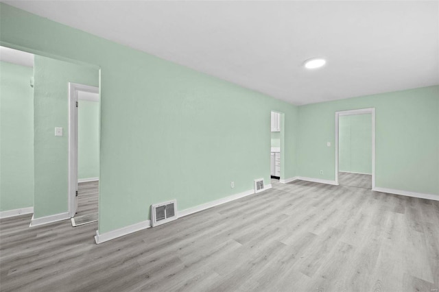 empty room featuring light hardwood / wood-style floors