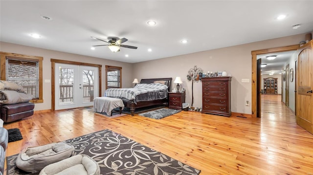 bedroom with access to outside, light hardwood / wood-style floors, french doors, and ceiling fan