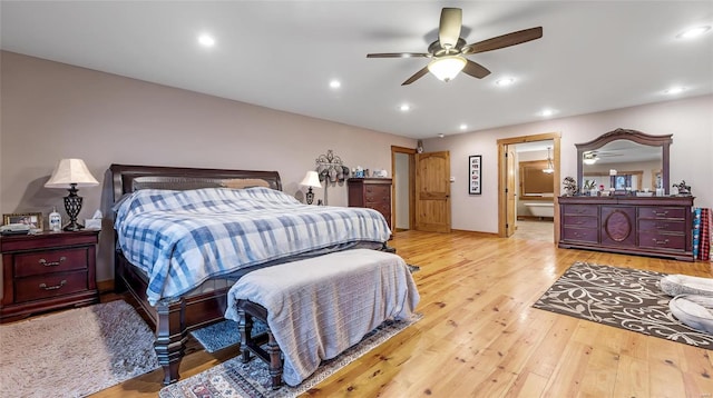 bedroom featuring ceiling fan and light hardwood / wood-style flooring