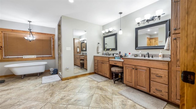 bathroom with vanity and a bathtub