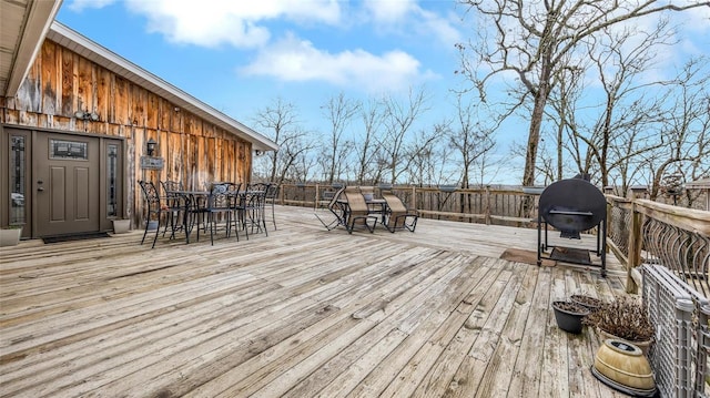 wooden deck with area for grilling