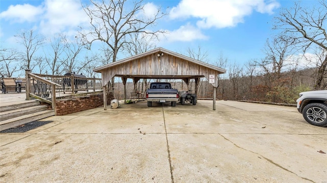 view of parking with a carport