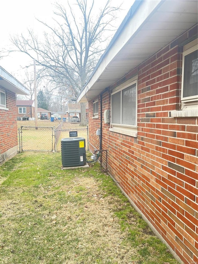 view of yard featuring central AC unit